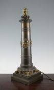 A Regency colza type ormolu mounted bronze lamp base, decorated with theatrical masks, 18in.