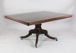 A Regency mahogany breakfast table, with rectangular top, foliate carved column and paterae