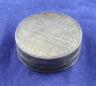 A late 18th/early 19th century silver mounted tortoiseshell circular snuff box and cover, with