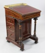 A Victorian amboyna wood and inlaid Davenport, with red leather skiver, stationery and three side