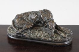 After Paul Joseph Raymond Gayrard (1807-1855). An animalier bronze figure of a reclining