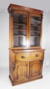 A Victorian mahogany secretaire bookcase, with two glazed doors above a secretaire drawer over two