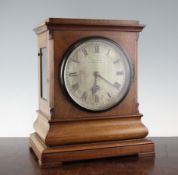 A Victorian mahogany mantel timepiece, with plain architectural case and silvered Roman dial