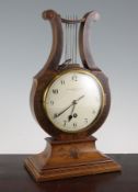 An Edwardian inlaid mahogany lyre shaped mantel timepiece, with painted dial signed J.C. Jennens &