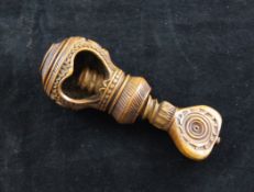 A continental carved coquilla nut nutcracker, with single screw thread, 4.5in.