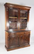 A Victorian mahogany secretaire bookcase, with ebonised banding, moulded cornice and two glazed