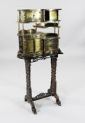 A Japanese gilt-decorated black lacquer collector`s cabinet, Meiji period, fitted with an