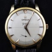 A gentleman`s 1950`s 18ct gold Omega manual wind wrist watch, with arrow numerals and subsidiary
