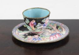 A Chinese Canton enamel European subject teabowl and saucer, Yongzheng / Qianlong period, each