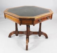 A 19th century reformed Gothic octagonal top walnut centre table, with green inset skiver over two