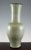 A large Chinese Longquan celadon yen-yen vase, 15th / 16th century, the baluster body carved with