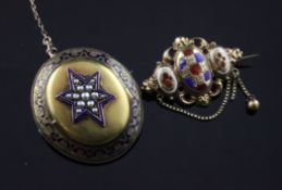 A Victorian gold and blue enamel pendant locket brooch with split pearl set star motif, of oval