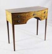 A George III rosewood banded mahogany bowfront dressing table, fitted three drawers on squared