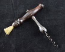 A 19th century direct pull corkscrew, with turned rosewood handle and end brush, with cork