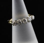 An Edwardian 18ct gold and graduated five stone diamond ring, with a total diamond weight of