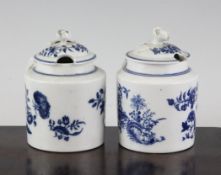 Two Worcester blue printed cylindrical mustard pots and covers, c.1770, the first decorated in the