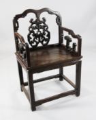 A Chinese hardwood armchair, with scroll pierced back and sides and solid seat, 2ft 1in. H.3ft 3in.