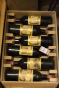 Twelve bottles of Chateau Ducru-Beaucaillou 1975, St Julien. All base of neck or better, labels