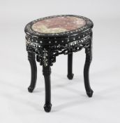 A 19th century Chinese mother of pearl inset hardwood occasional table, with red marble inset oval