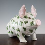 A large Wemyss clover leaf pattern pottery pig, in seated pose, impressed mark Wemyss ware, RH & S