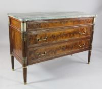 A Directoire period ormolu mounted flame mahogany commode, with veined green marble top, three