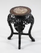 A 19th century Chinese hardwood vase stand, with marble inset top, carved with bamboo, 1ft 7in.
