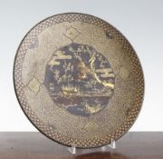 A Japanese gilt-decorated lacquered iron dish, Meiji period, the centre with a cockerel and