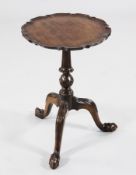 A Chippendale style mahogany wine table, with piecrust top and carved tripod base, 1ft 2.5in. H.