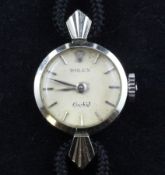 A lady`s 18ct white gold Rolex Orchid manual wind wrist watch, with baton numerals and fan shaped