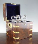 A 19th century brass bound mahogany military decanter box, together with its brown leather outer