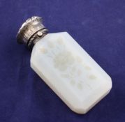 A 19th century silver mounted opaline glass scent bottle, with foliate embossed hinged lid and glass