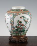 A Samson famille verte ovoid jar, painted with flowers and insects on a floral ground, 7.4in. (18.