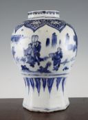 A Chinese blue and white octagonal baluster vase, Transitional period, painted with a dignatory