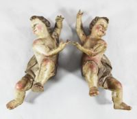 A pair of 19th century carved and painted Italian cherub figures, 24in.