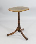 An early 19th century yew wood tripod table, with octagonal burr yew wood top, W.1ft 5.75in.