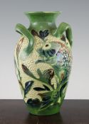 A Baron Ware Barnstaple pottery `fish` vase, early 20th century, decorated in coloured slips with