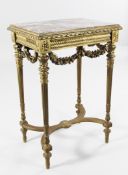 A Louis XVI design carved giltwood rectangular side table, with red marble inset top, floral swags