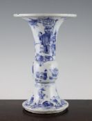 A Chinese blue and white beaker vase, Gu, early Kangxi period, c.1670, the vase with trumpet