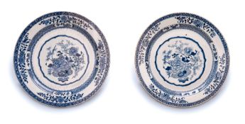 A PAIR OF CHINESE BLUE AND WHITE CHARGERS, EARLY 19TH CENTURY, 41cm diameter, with restoration (2)