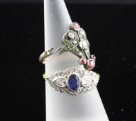 A 1920`s/1930`s 18ct gold, sapphire and diamond cluster dress ring, with central oval cut sapphire