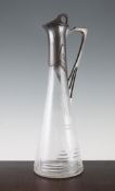 A WMF Jugendstil pewter and cut glass claret jug, stamped marks to handle, 17in.