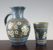 A C.H. Brannam, Barum pottery jug and matching beaker, by James Dewdney, c.1888, incised and slip