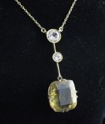 A gold, citrine and white sapphire drop pendant, with large cushion cut citrine and two graduated