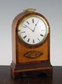 An Edwardian inlaid mahogany mantel timepiece, with enamelled Roman dial and Georgian verge watch