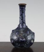 A Martin Brothers stoneware bottle vase, predominantly coloured in blue, inscribed mark Martin Bros.