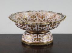 A Chinese rouge-de-fer and gilt-decorated stem dish, 19th century, painted with tall flowers to