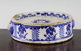A Continental tinglaze strainer dish, 18th / 19th century, decorated with a repeating design of