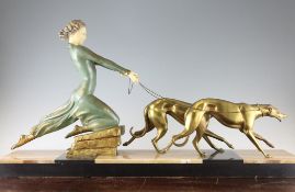 A French Art Deco patinated metal figure group of a young maiden, with two hounds on a black