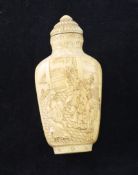 A Japanese ivory snuff bottle for the Chinese market, late 19th century, carved in high relief