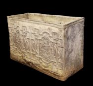 A large early 18th century rectangular lead water cistern, dated 1715, decorated with moulded